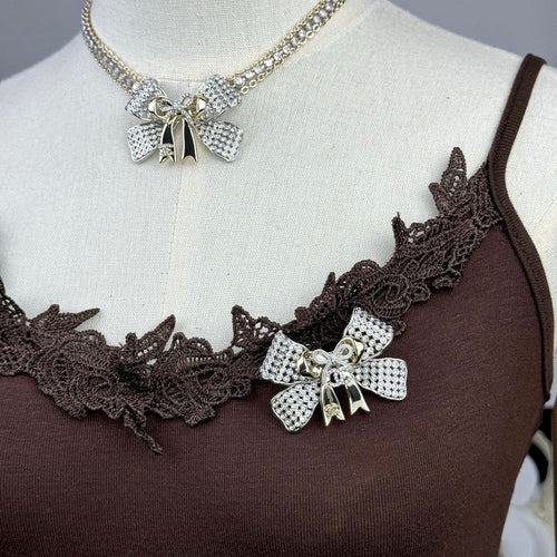 18K CC 25K Bow Tie Diamond Brooch